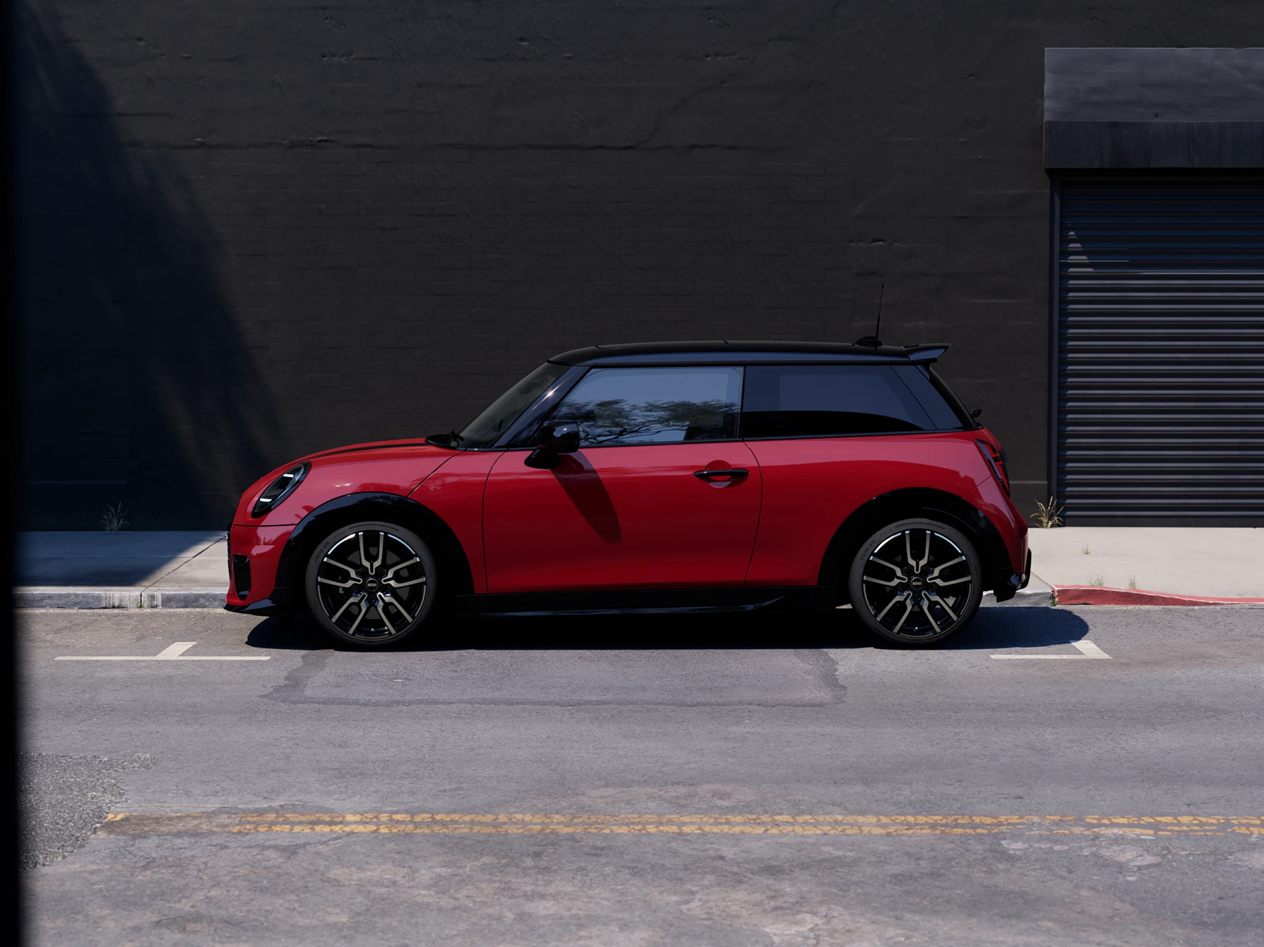 Side view of the MINI Cooper in Chili Red and Black Roof parking.
